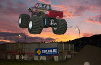 Monster Truck jump at sunset